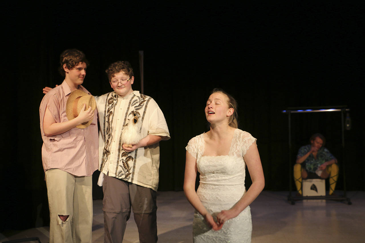 (Photo by Debbie Hornback) Montesano High School students Robert Thomas, Seth Springs and Rachel Ayres perform during a recent dress rehearsal for the upcoming musical production of “Twelfth Night.” The musical has performances April 28-30.