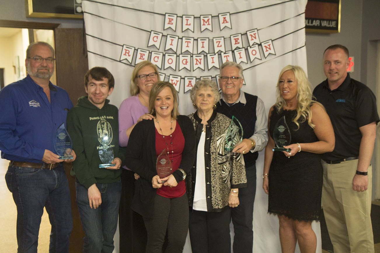 (Travis Rains | The Vidette) Elma award winners gather for a group shot at the Elma Citizen of the Year banquet May 5.