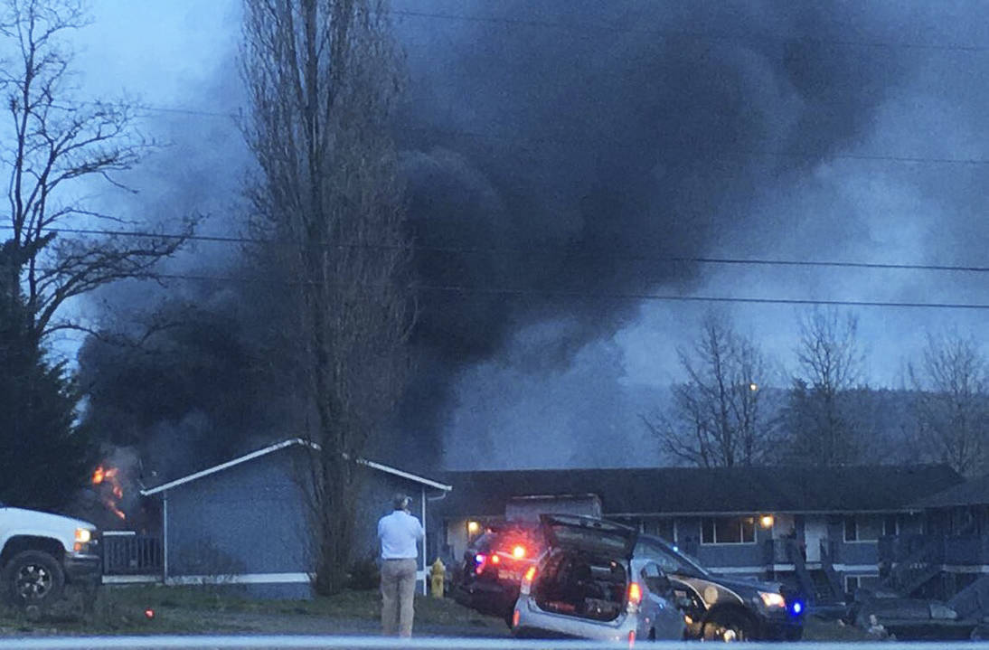 Photo by Brittnee Morris                                Crews from multiple agencies were able to keep an Elma apartment fire contained to a single unit, which was destroyed along with all its contents. One resident was taken as a precaution to Summit Pacific Medical Center for smoke inhalation.