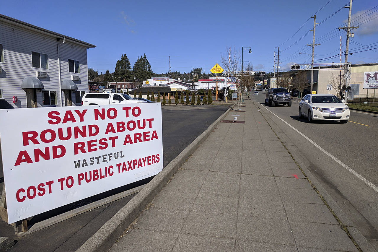 (Corey Morris | The Vidette) A sign on the corner of the Montesano intersection where the Highway 12 westbound off-ramp meets State Route 107 and the Monte Square parking lot.